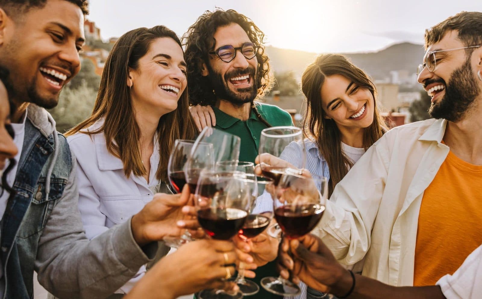 Friends outdoors toasting with red wine. Avanos Wine Tasting, arranged from The Owl Cave Hotel in Göreme, Cappadocia.