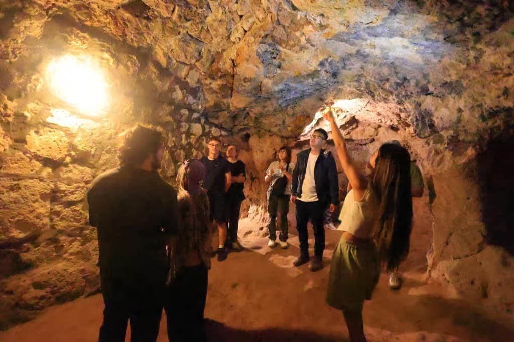 Guided visit inside a Derinkuyu cave chamber on the Cappadocia Green Tour from The Owl Cave Hotel, Cappadocia