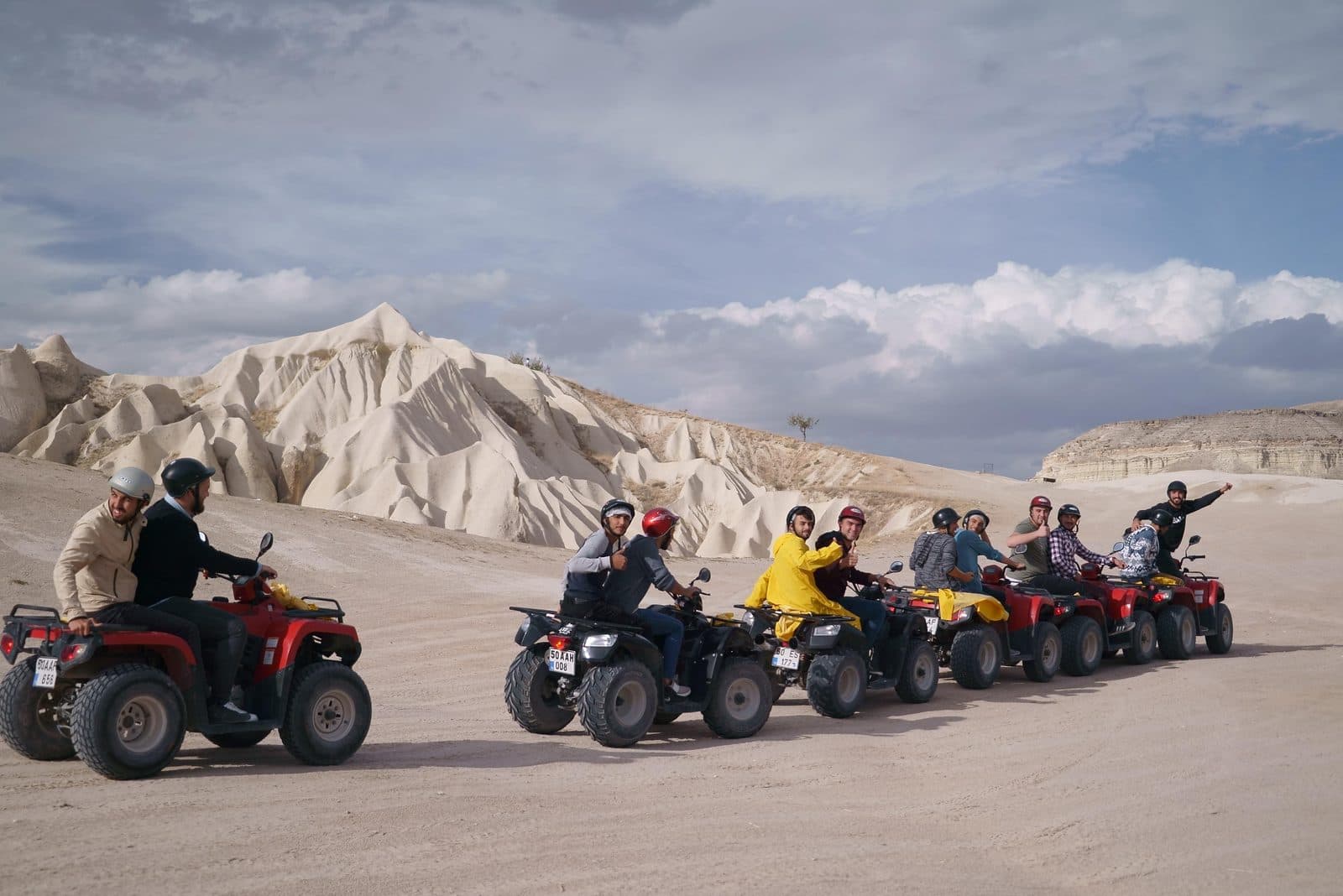 A group lined up on red ATVs. Sunset ATV Safari, arranged from The Owl Cave Hotel in Göreme, Cappadocia.