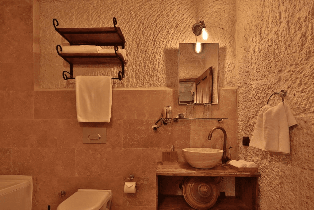 Private bathroom sink and toiletries in the bookable Cave Suite at The Owl Cave Hotel in Göreme