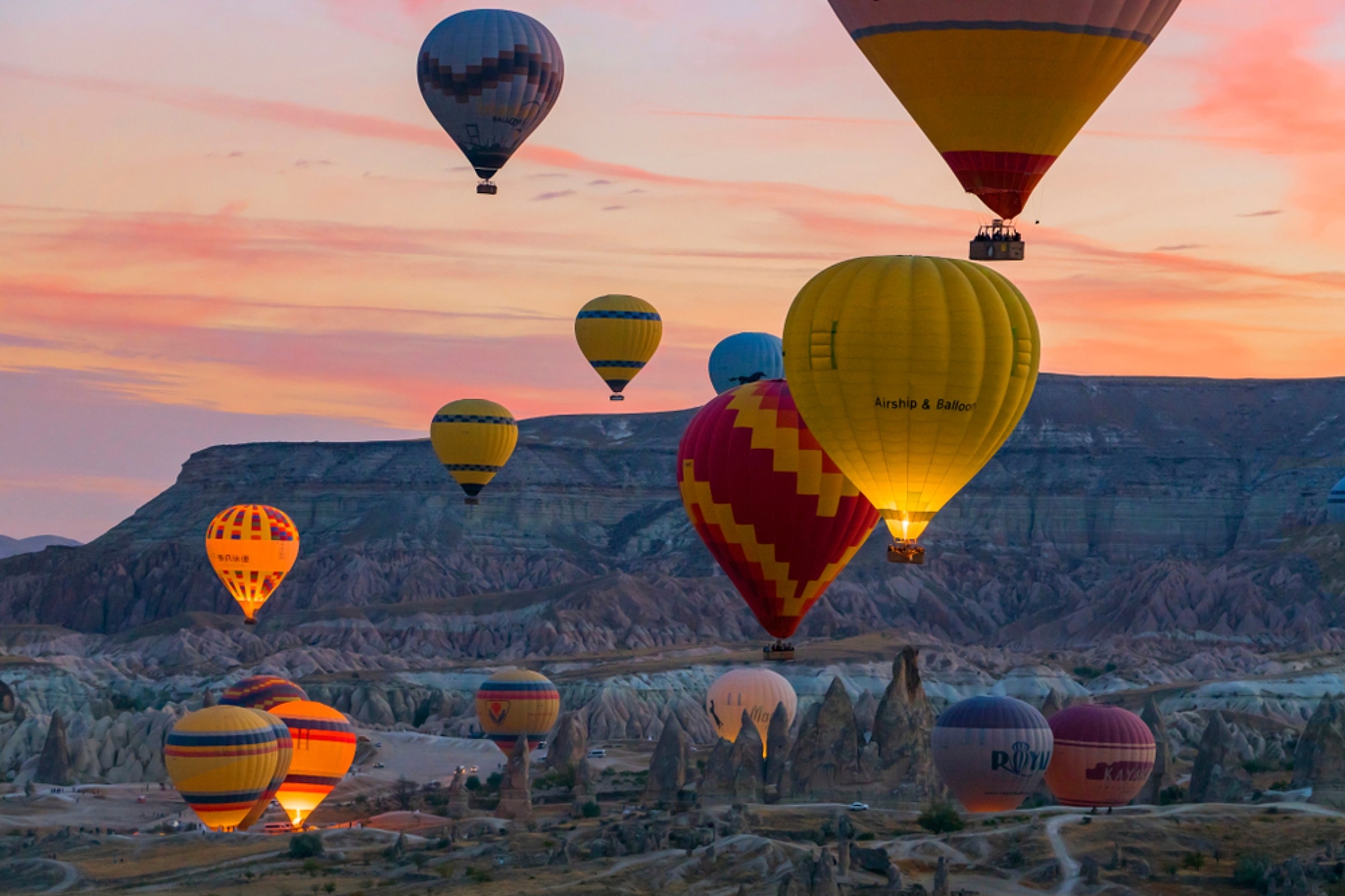 Hot air balloons at sunrise over Göreme National Park, Cappadocia