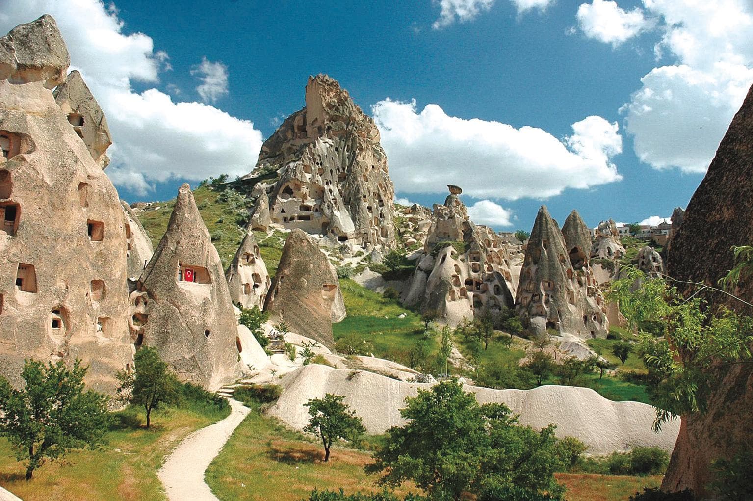 A winding path through fairy chimneys. Green Tour with Narlıgöl, arranged from The Owl Cave Hotel in Göreme, Cappadocia.